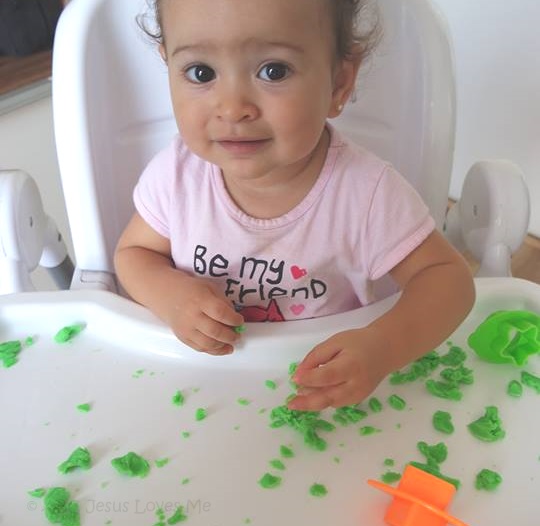 Child playing with Play Dough.