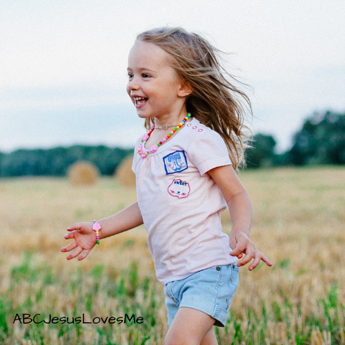 Child running in the summer.