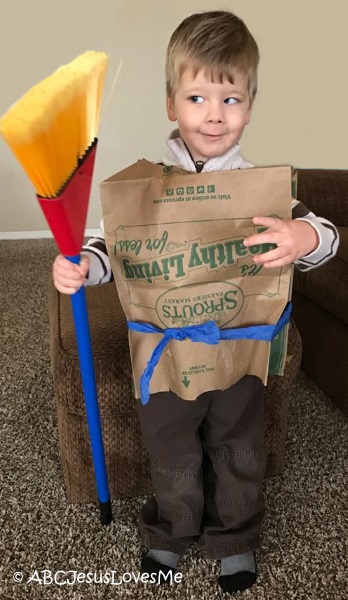 Little boy dressed up as a shepherd.