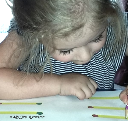 A little girl working on handwriting.